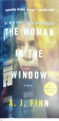 THE WOMAN IN THE WIND0W